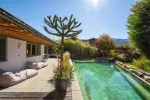 Exklusiver Bungalow in Sonnenlage mit Schwimmteich